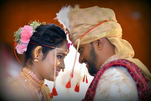 Premium Vector | Maharashtrian young couple wearing wedding dress in  namaste pose against cosmic latte background